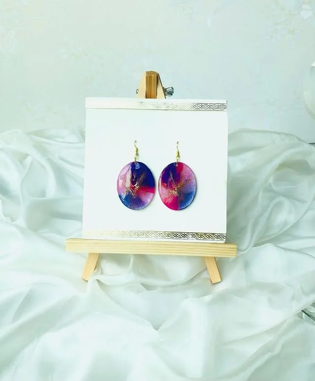 A true work of art, these multi-color resin earrings