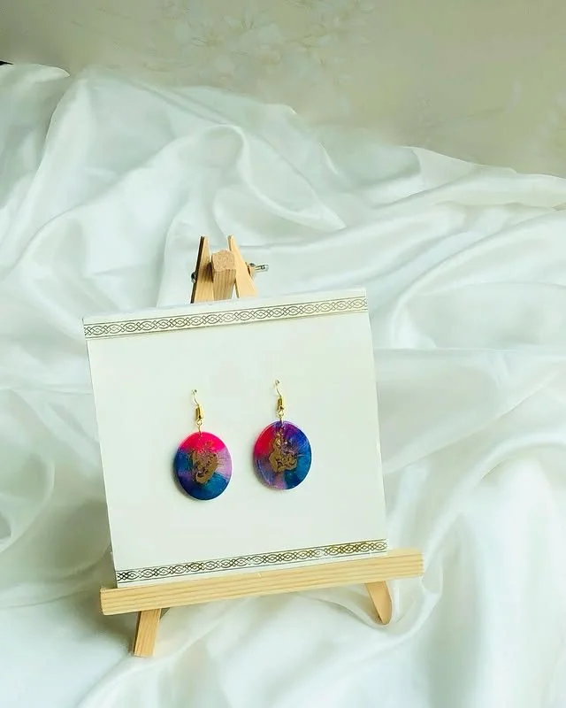 A true work of art, these multi-color resin earrings