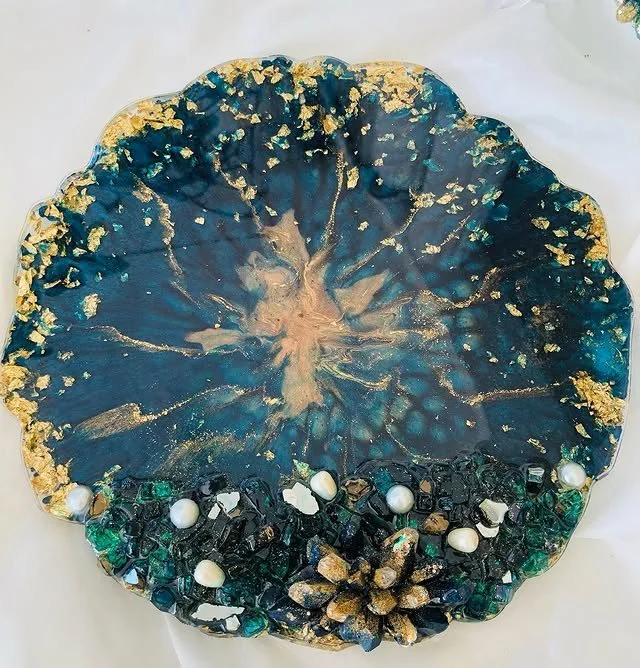 This handmade resin candle plate combines artistry and